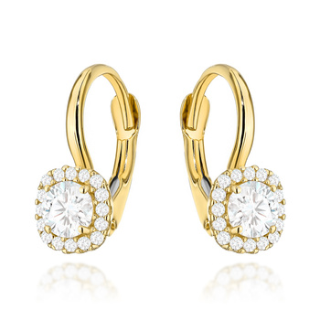 Złote kolczyki delikatnie wiszące z cyrkoniami