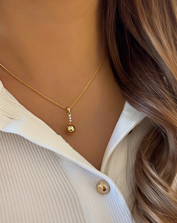 Złota zawieszka kulka z cyrkoniami