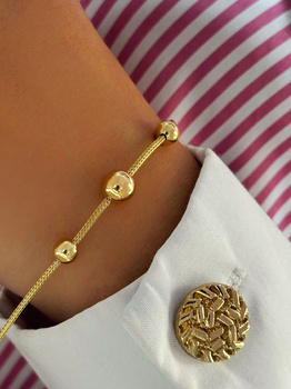 Złota bransoletka z kulkami 