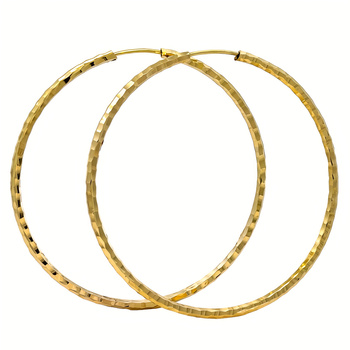 Złote kolczyki koła z diamentowaną powierzchnią