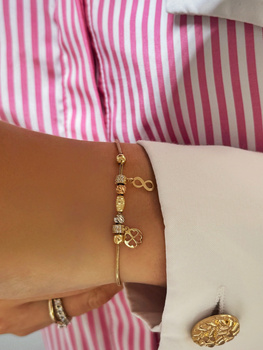 Złota bransoletka z koralikami