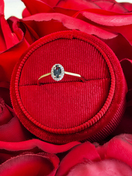 Złoty pierścionek z diamentami i Topazem London Blue